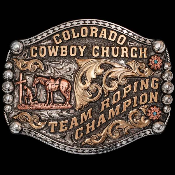 Show off your cowboy style with the Jefferson Belt Buckle. This team roping belt buckle features unique silver beads, bronze scrollwork and diamond stamped edge. Personalize this design now!
